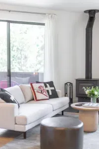 Our wood burning fireplace is here for you to enjoy! The sofa faces extra large windows to watch the snow fall and plan your perfect ski day.