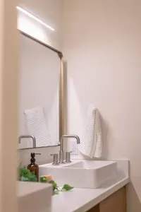 No fighting over sinks or counter space here-the double vanity in the primary bedroom's ensuite has plenty.
