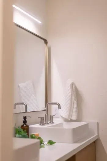 No fighting over sinks or counter space here-the double vanity in the primary bedroom's ensuite has plenty.