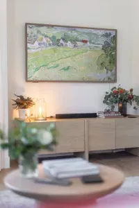 Fully decked out with a 65" HDR CanvasTV, our living room is set up for streaming all of your favorite shows. Rather enjoy the views and the company? Set it to Artmode and enjoy one of many games we stock in the console just below.