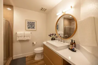 Our full bath with new vanity plus standing  shower is just off of the hallway