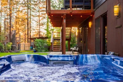 Relax in out hot tub under the pines! Photography by @heypamcakes