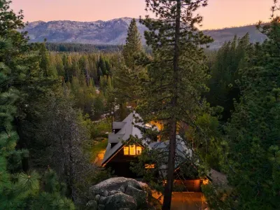 Bird's eye view of Echo View Chalet, hosted by Modern Mountain Vacations. Enjoy a private, quiet  neighborhood, stunning views of the Sierra Nevada mountain range, and the best sunsets Tahoe has to offer.  @dirtandglass
