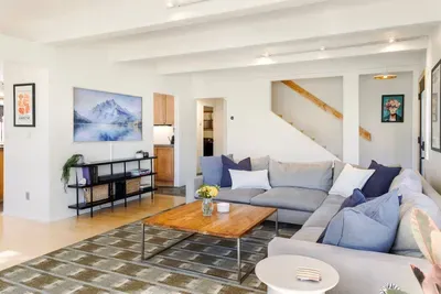 Our guests love curling up on our ultra comfortable oversized sectional sofa.

@dirtandglass