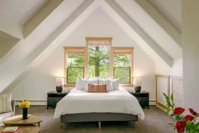 Cozy is an understatement. Our primary suite features forest and mountain views, a King size Thuma bed and Purple mattress, its own dedicated seating area, a brand new 65" television, its own spa like ensuite bathroom and plenty of closet space.