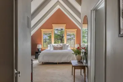 Entrance to the primary suite, which is just a few steps away from the flexible/kids room upstairs. There is a walk-in closet to the left and the ensuite bath to the right. This room is spacious!