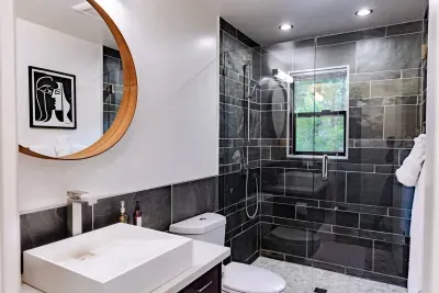 Our downstairs full bathroom right across the hall from the downstairs King bedroom.


@dirtandglass