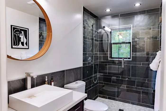 Our downstairs full bathroom right across the hall from the downstairs King bedroom.


@dirtandglass