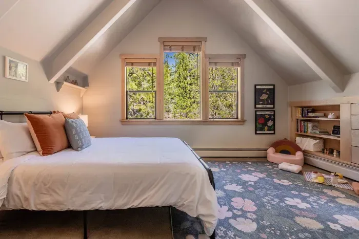 Entrance to the flex room upstairs, with treetop views.  This is just steps away from the primary suite. 