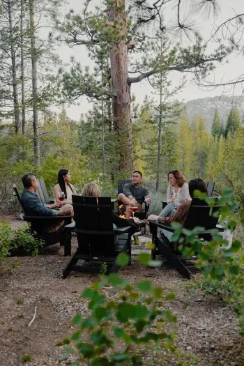 The fire pit area in the backyard, complete with Adirondack chairs is a favorite amongst our guests to gather around and enjoy each others company. The best memories are made here!