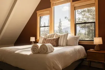 Our primary suite features some amazing mountain views! Simply lay back and take in the stars overhead at nighttime.