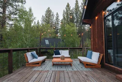 The back patio is great for relaxing and admiring the views! You're surrounded by a quaking aspen grove and pine trees.