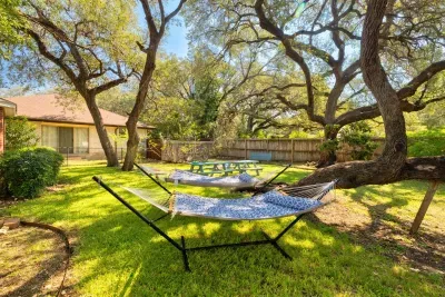 Enjoy the outdoors with two hammocks, two picnic tables, and lots of open space.