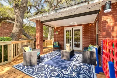 Covered patio with lots of seating to hang out and relax.