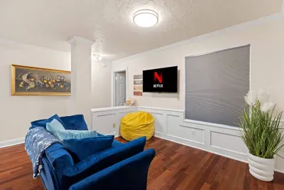 Cozy second living area with a sofa bed — perfect for kids’ movies or extra guests.