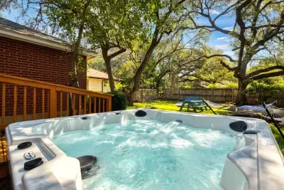 Relax in the backyard hot tub after a long day!!!!