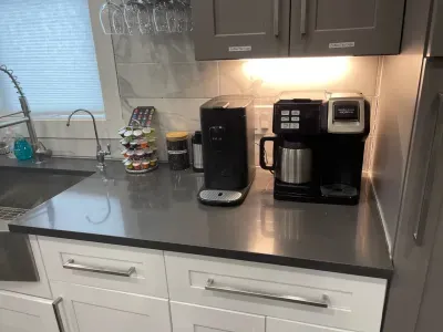 Indulge in our fully stocked coffee bar, where you can brew your favorite drinks at any time of day. 