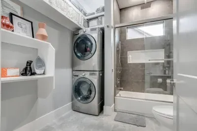 Conveniently situated inside one of our full bathrooms is a well-equipped laundry area. We supply laundry detergent and plenty amount of paper products for your convenience.
