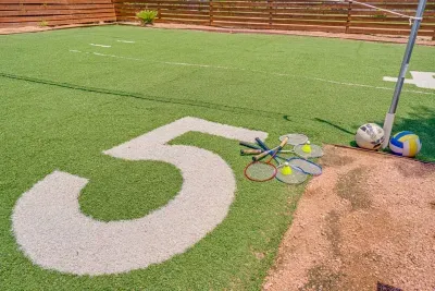 Enjoy a game of badminton with our provided equipment in the spacious backyard. 