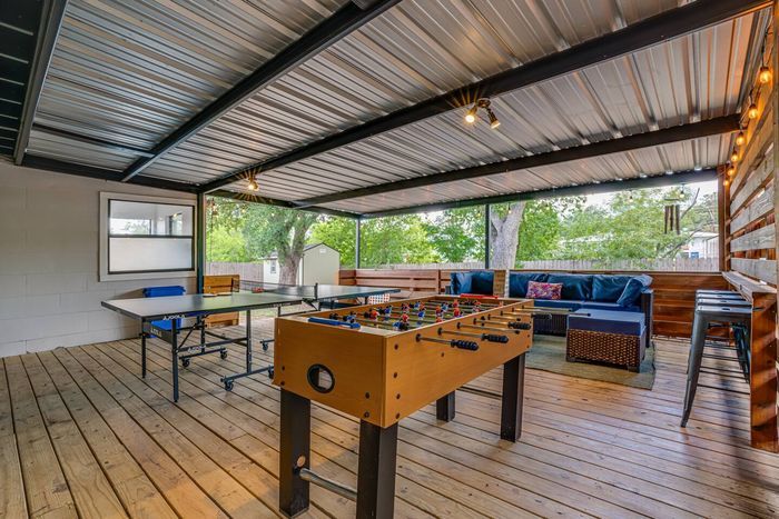 Step outside and dive into the action! 

Our outdoor space features a ping pong table and a foosball table, making it the perfect spot for some fresh-air fun and friendly competition.

