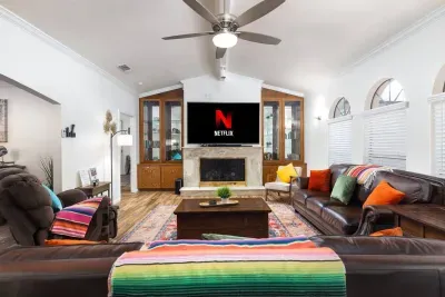 85 Inch HD TV, Large area with two queen size sleeper sofas