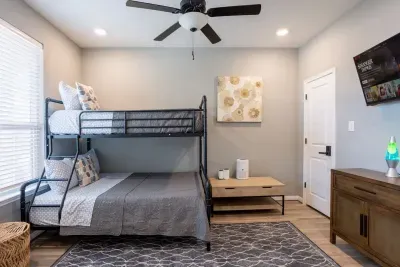 Room with full-size bottom bunk and twin top. Located downstairs.