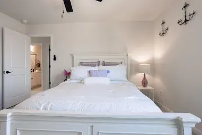 Upstairs cozy room with queen bed.