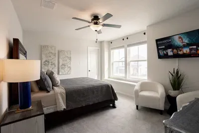 Private second master with attached bath. Located upstairs.