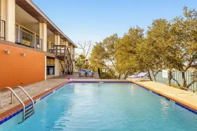 A spacious pool area perfect for swimming, lounging, and enjoying sunny days with plenty of room for relaxation and fun.