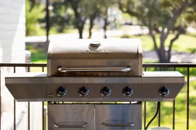 A propane grill on the patio, ideal for convenient outdoor cooking and BBQ gatherings.