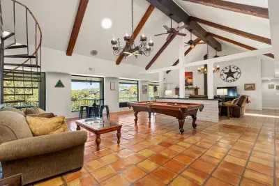 Gather around the billiard table for some friendly competition, then kick back on the cozy sofa by the center table, your perfect spot to relax and enjoy good times with friends and family.