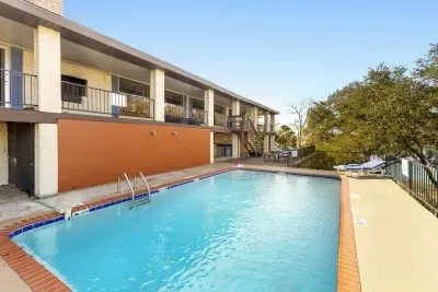 A spacious pool area perfect for swimming, lounging, and enjoying sunny days with plenty of room for relaxation and fun.