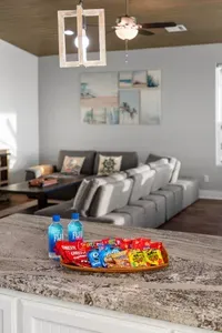 A warm welcome awaits with a spacious living area that’s perfect for relaxing and unwinding after a day at the beach.