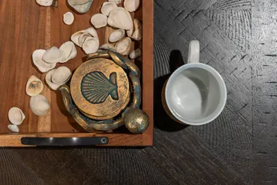 A coastal-inspired touch for your stay, featuring charming shell décor and a relaxing spot to enjoy your morning coffee or evening wind-down.