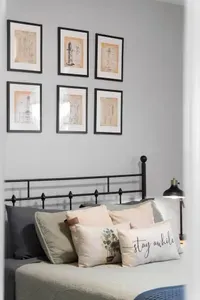 Cozy up in this inviting bedroom with a comfy bed, soft linens, and relaxing coastal decor—perfect for a great night’s sleep after a day in the sun.