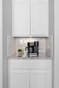 Coffee station ready for slow mornings and easy starts, featuring a Keurig for your favorite cup anytime.