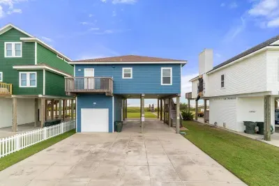Driveway leading up the house. Plenty of parking under the house and in the driveway.  Please do not park on the road.