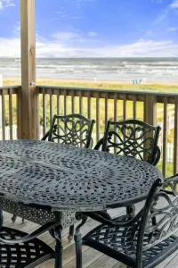 Outdoor patio table for relaxing or enjoying your meals listening to the ocean waves roll in.