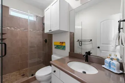 One of the two full bathrooms in the house.  Located between two of the bedrooms.