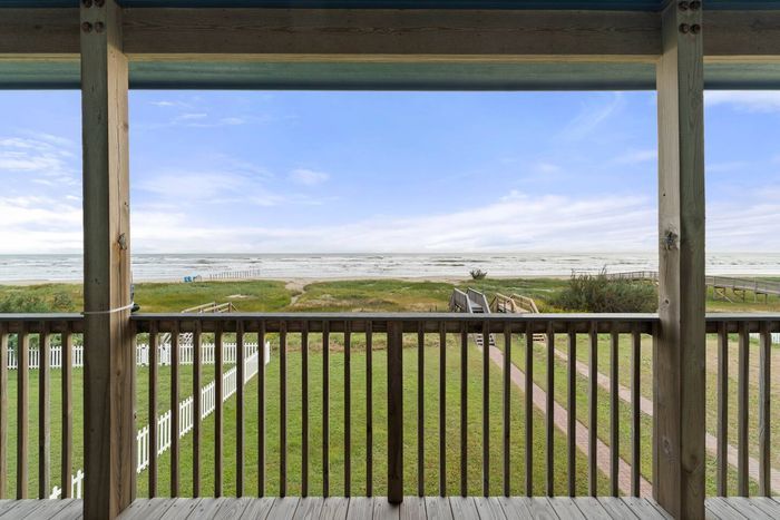 Enjoy breathtaking sunrises and the soothing sound of ocean waves from the front porch deck. Spend your days on the beach, easily accessed via your private walkway leading directly to the sand and surf.