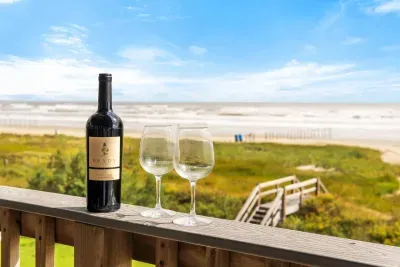 Enjoy breathtaking sunrises and the soothing sound of ocean waves from the front porch deck. 