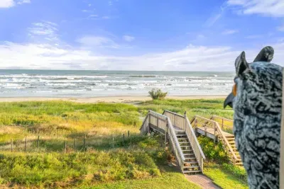 Private walkway over the sand dunes to the beach.