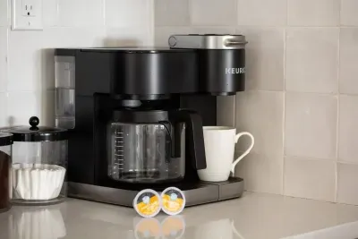 Start your mornings right! Enjoy a fresh cup of coffee with the convenient coffee maker, perfect for sipping while planning your day or relaxing in the cozy Mountain Top Retreat vibes.