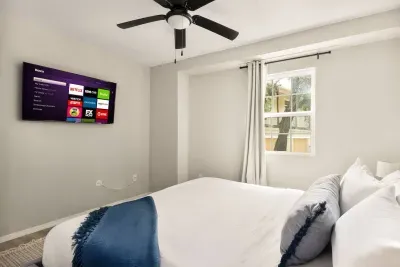 Cozy bedroom with a plush king bed, soft linens, and a Smart TV with Netflix. Relax in comfort after a day at the lake and enjoy streaming your favorite shows right from bed.