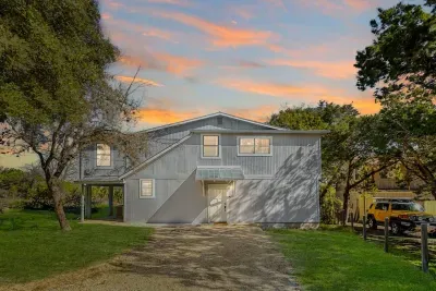 Charming two-story retreat at Canyon Lake with plenty of space, surrounded by trees and nature. Enjoy easy access, private parking, and a peaceful setting perfect for your Texas Hill Country getaway.