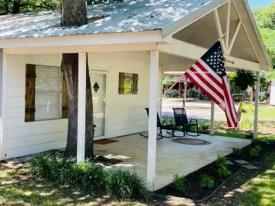 Large front porch that is perfect to sit in the shade and relax.  Excellent spot to drink your morning coffee and watch the sun come up over the community.