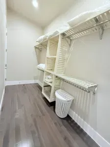 Stay organized with a roomy walk-in closet, perfect for unpacking, hanging up your wardrobe, and settling in for a comfortable extended stay.