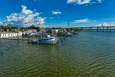Located minutes from the Bay! This view captures a nearby marina showcasing the easy access to Galveston Bay. Bring your boat, we have space to park it, and enjoy coastal life, fishing, and dining close to the retreat.