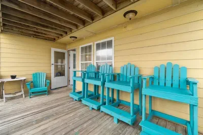 Second level deck includes elevated chairs to take in the amazing views of the beautiful sunrises.