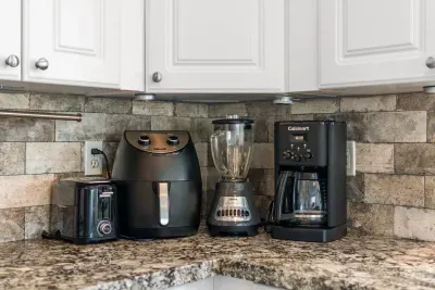 Fully stocked kitchen with all the appliances and utensils that you need to prepare any meal needed.  Kitchen include toaster, air fryer, blender, and coffee maker are all part of the appliances.